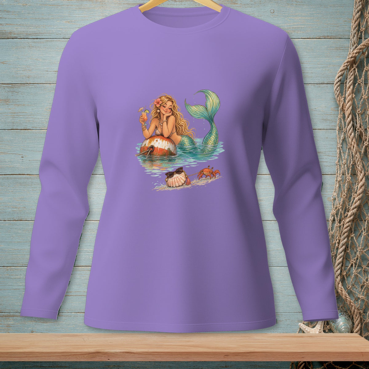 Purple long-sleeve shirt with illustration of a mermaid with a drink and a crab.