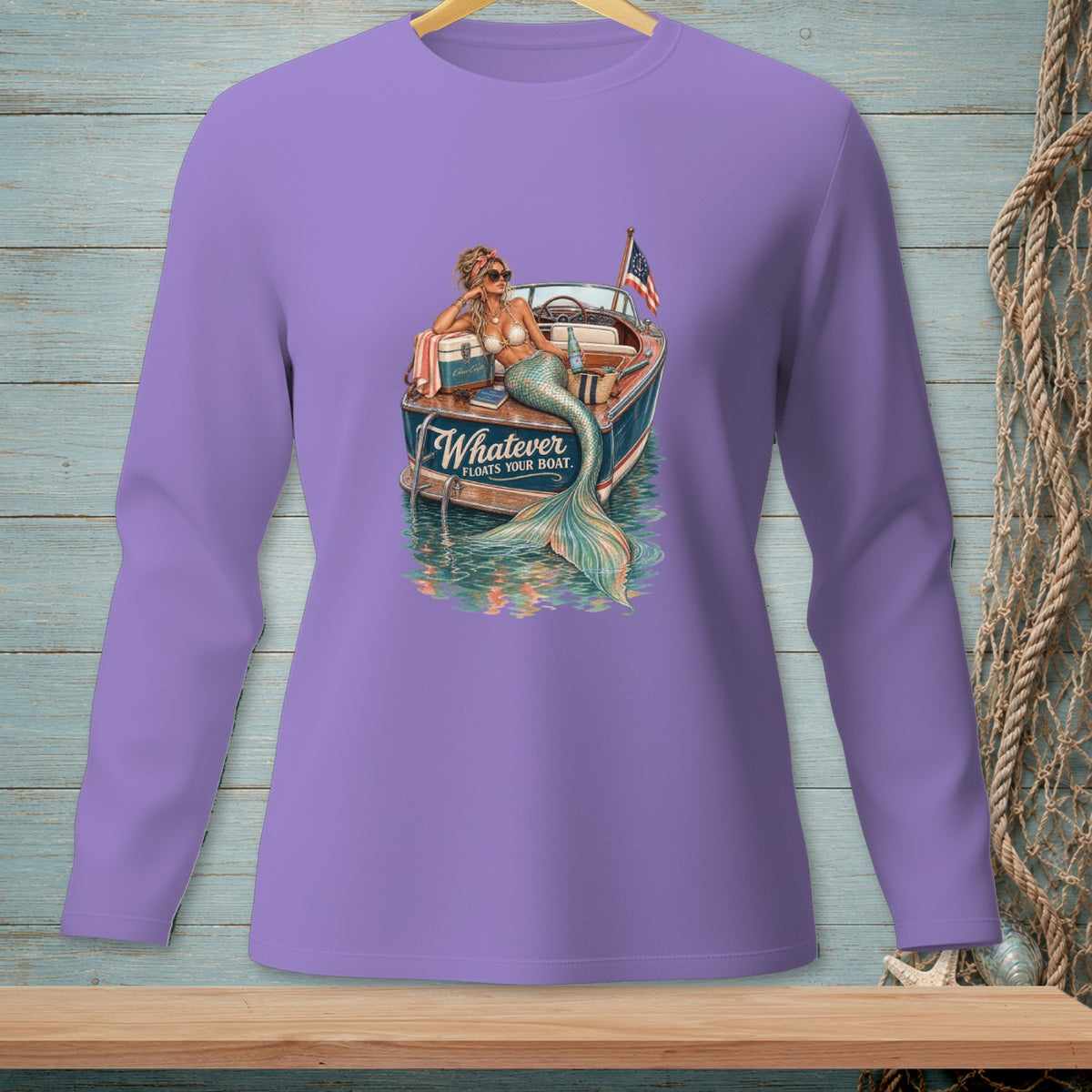 Mermaid on a boat with text "Whatever Floats Your Boat".