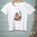 White t-shirt featuring a mermaid with a seagull on a rock.