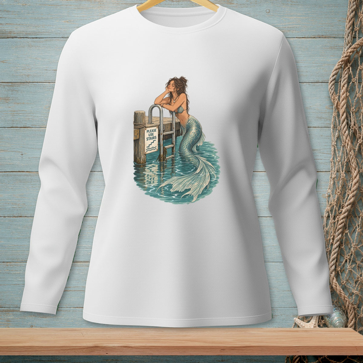 Mermaid resting on dock ladder near water, with "Please use stairs" sign.