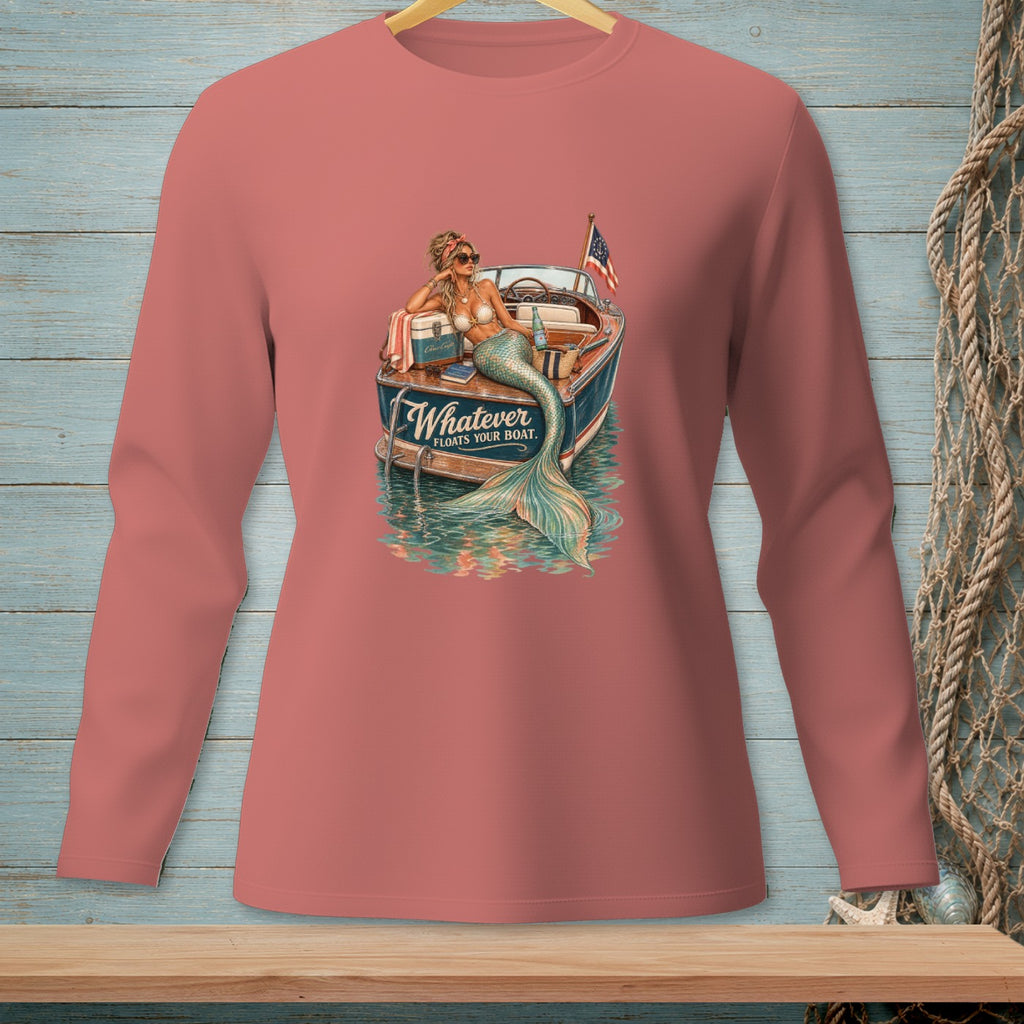 Mermaid relaxing on a boat with text "Whatever Floats Your Boat."