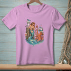 Mermaid and octopus on pier with boat, seagulls, and signs reading "MARINA", "TIDES & TUNES", and "FRESH CATCH".