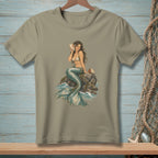 T-shirt with a detailed illustration of a mermaid holding a conch shell.