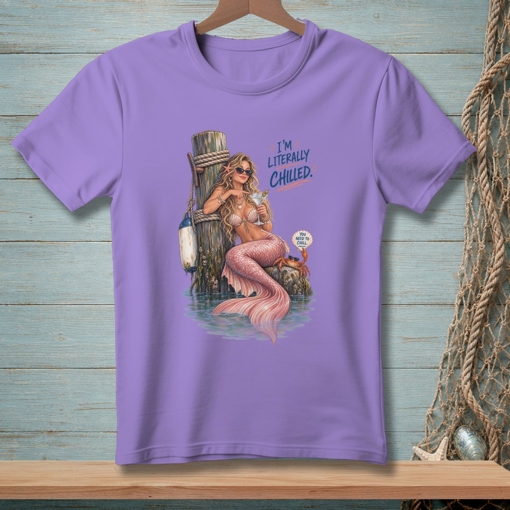 Lavender t-shirt with a mermaid sitting on a pier holding a drink and text "I'M LITERALLY CHILLED."