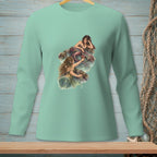 Mint green long-sleeved shirt featuring an illustration of two mermaids on rocks.