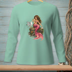 Mint green long-sleeve shirt with a graphic of a mermaid and seagull on a rock.