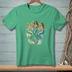 Three mermaids with champagne toasting on a teal t-shirt.