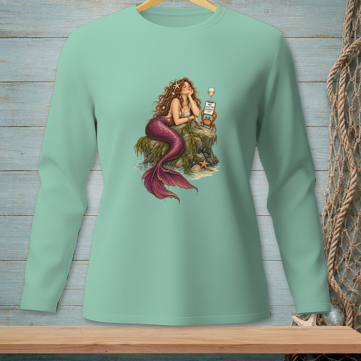 Long-sleeve shirt with a mermaid sitting on a rock with a crab and wine.