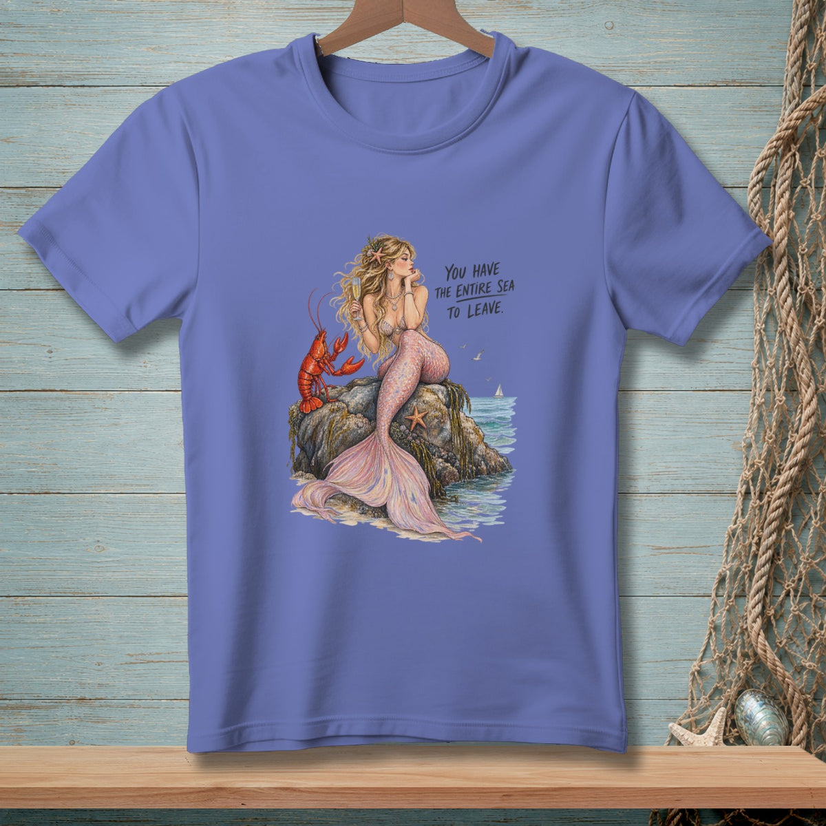 Mermaid and lobster on rock with text "You have the entire sea to leave."