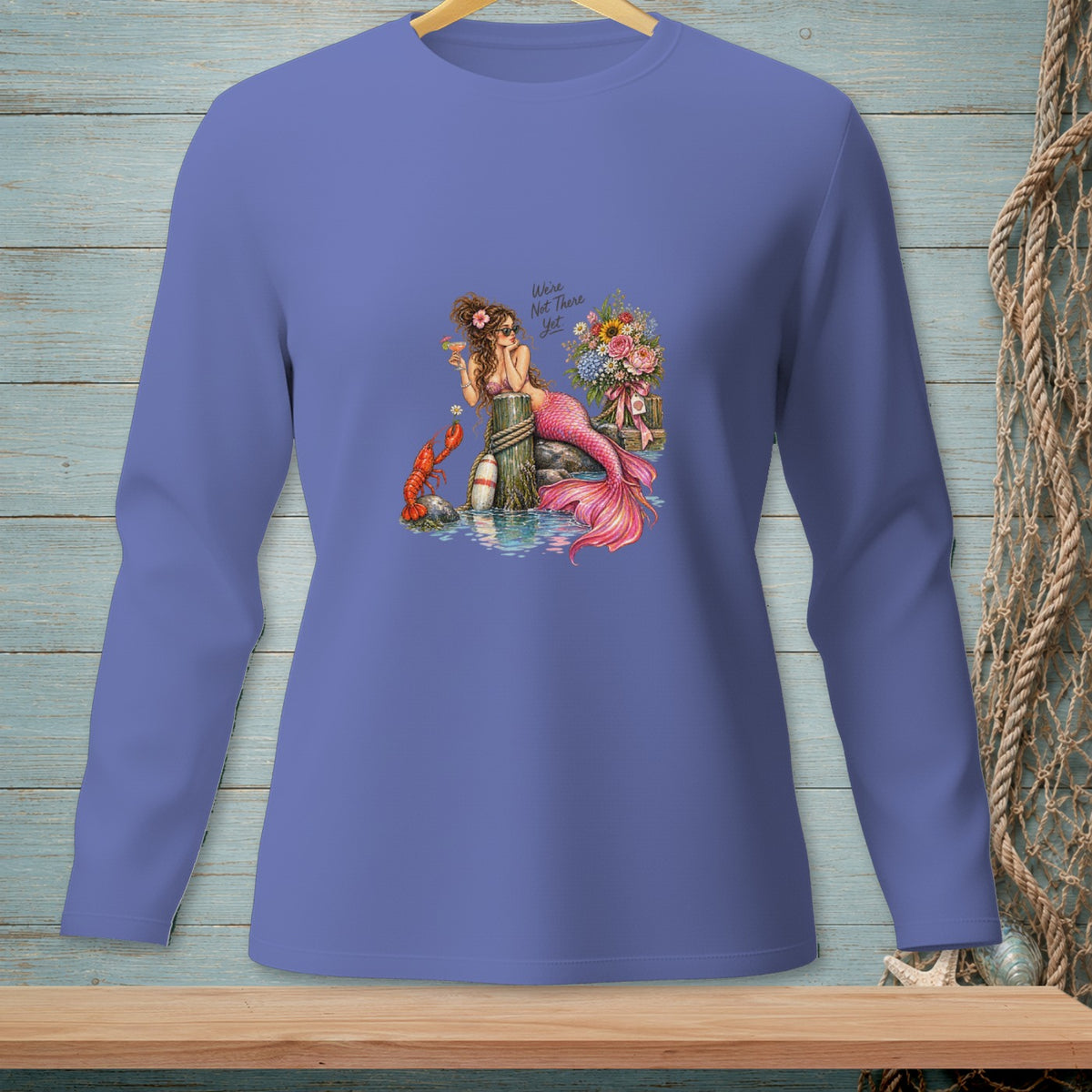 Mermaid with lobster and flowers, "We're Not There Yet" text.