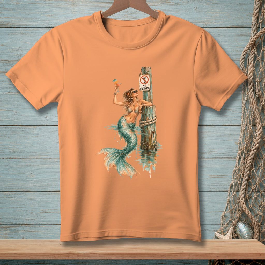 Mermaid with cocktail by post with "No Drinking" sign on peach t-shirt.
