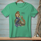 Green t-shirt with a mermaid holding flowers and a lobster, with "QUALITY CONTROL" text.