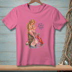 Pink t-shirt with a mermaid and lobster graphic that reads "WE'RE ALMOST THERE."