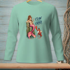 Mermaid and lobster graphic with "Claw and Order" text on a mint green long-sleeve shirt.