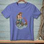 Mermaid sitting on rock with lobster and pearl in the water.