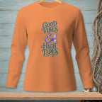 Orange long-sleeve shirt with "Good Vibes & High Tides" and a mermaid tail graphic.
