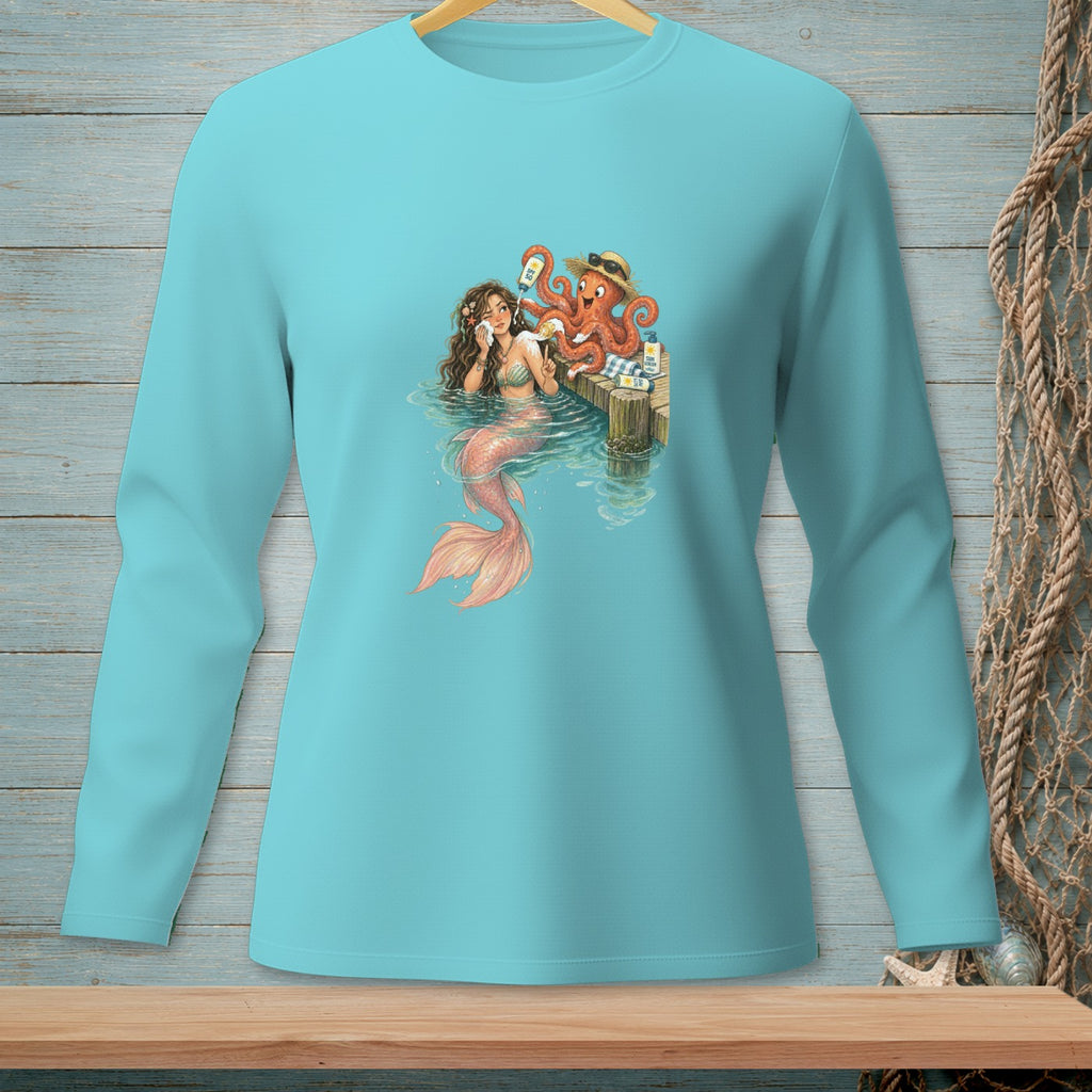 Mermaid and octopus on a dock with sunscreen bottles and a beach towel.