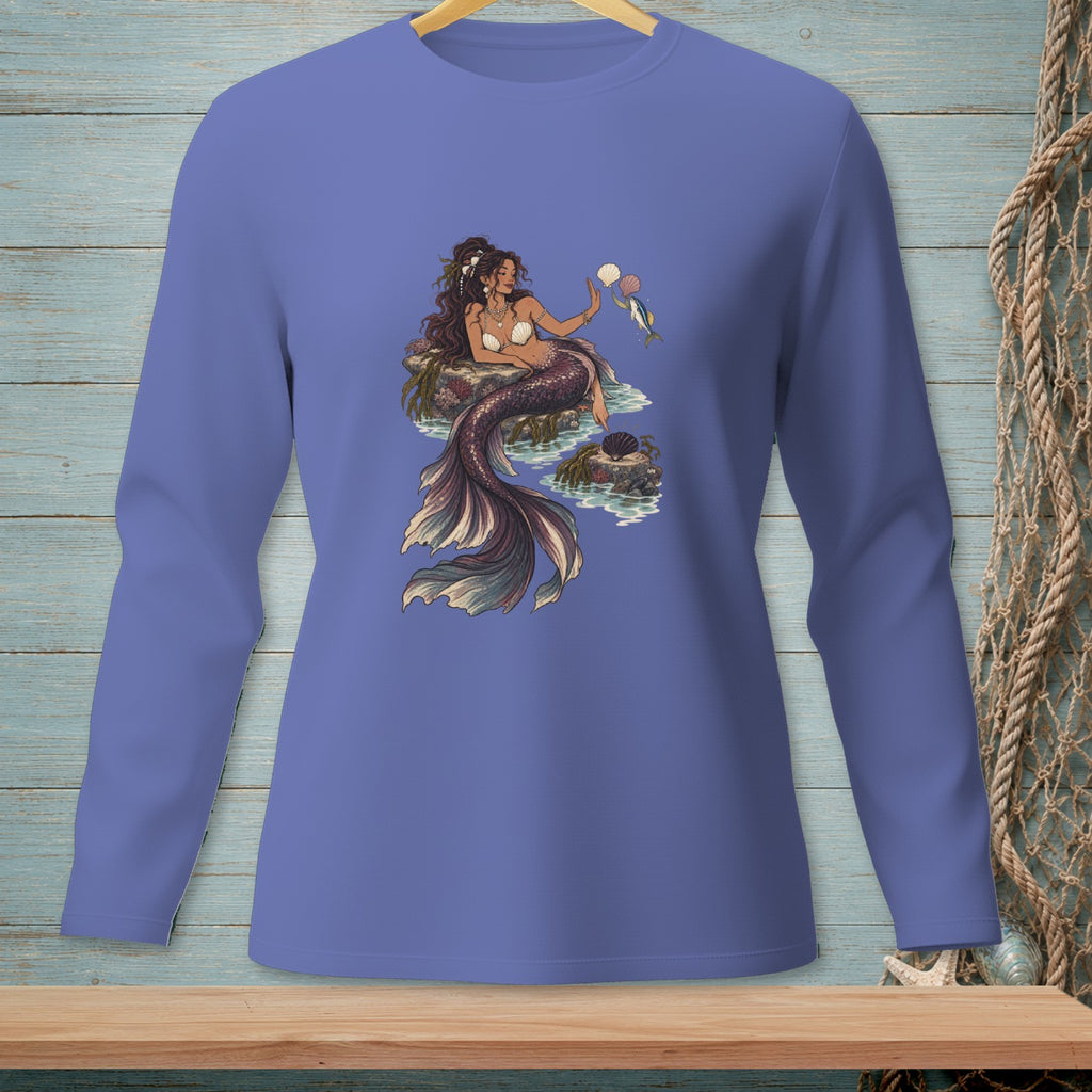 Illustration of a mermaid holding shells and a fish on rocks in water.