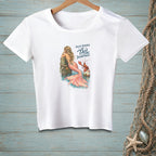 White t-shirt with graphic of mermaid and lobster and text "You've reached the tail department."