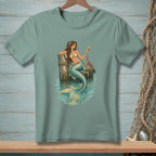 Mermaid on a dock with a cocktail and a crab.