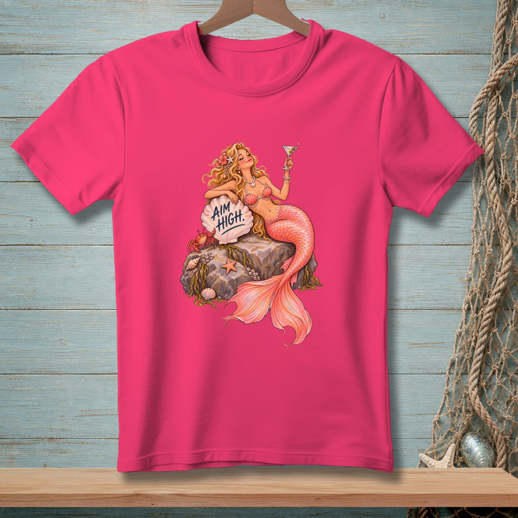 Pink t-shirt with a blonde mermaid holding a martini glass, text "AIM HIGH".