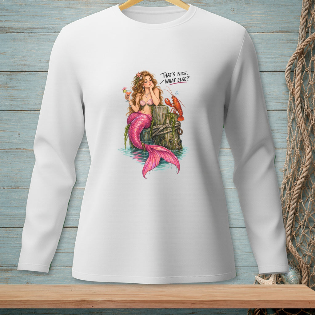 Mermaid with pink tail holding a drink, near a lobster, with text "That's nice. What else?"