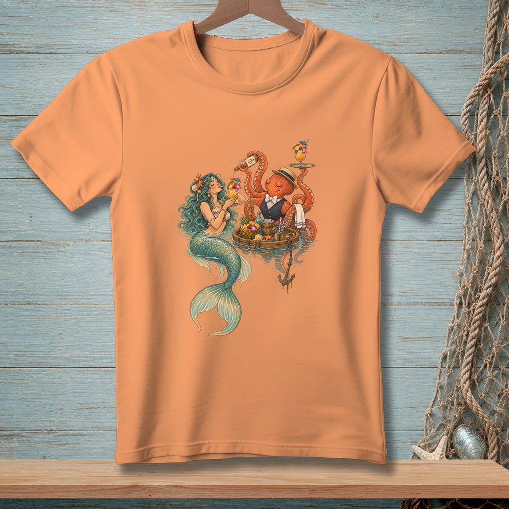 Peach t-shirt featuring a mermaid and octopus serving drinks on a raft.