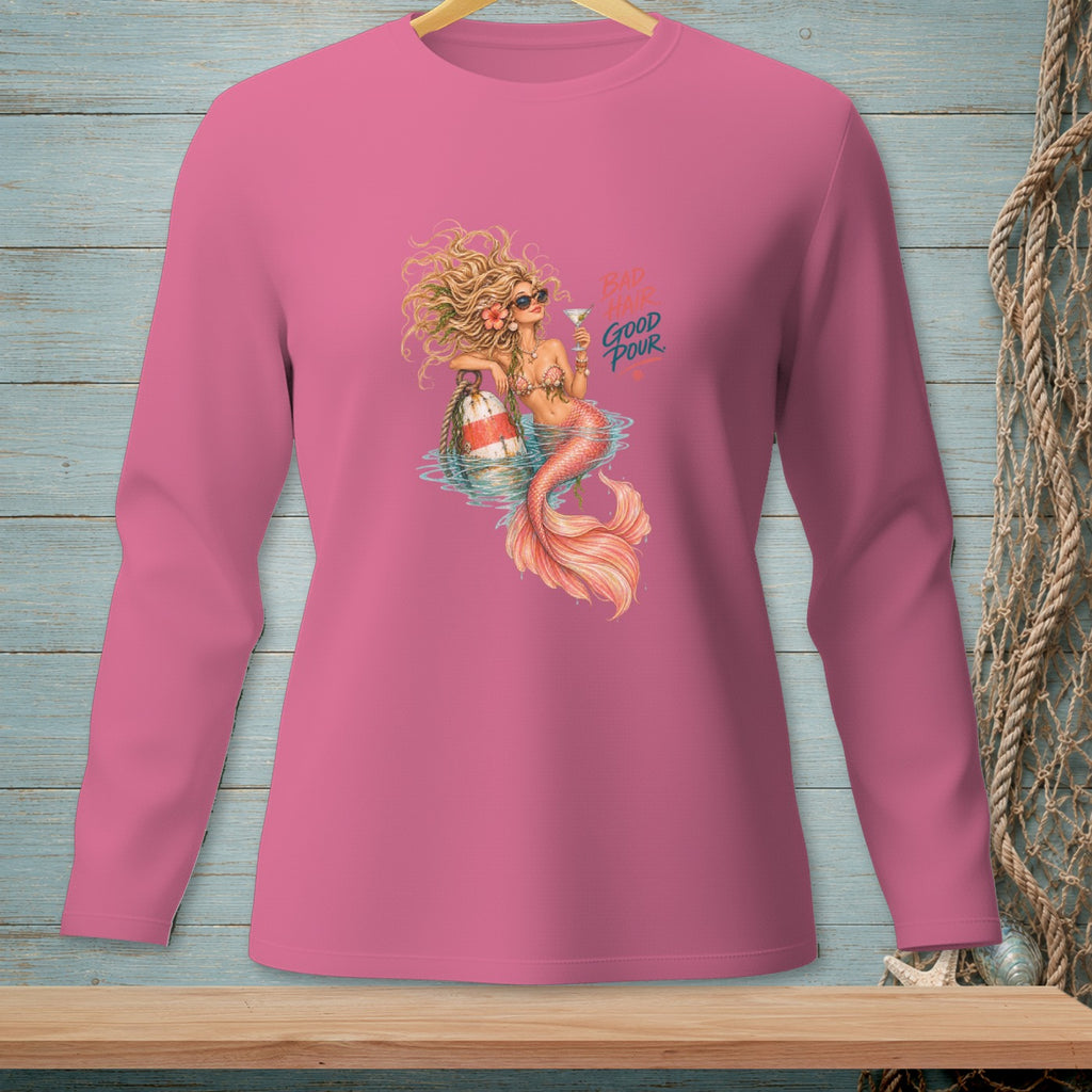 Pink long-sleeve shirt with mermaid graphic and text "BAD HAIR GOOD POUR".