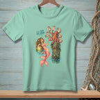 Mermaid offers a drink to an octopus surrounded by signs on a pilings.