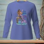 Mermaid sitting on a dock with a drink and text "SEA HAIR ZERO CARE".
