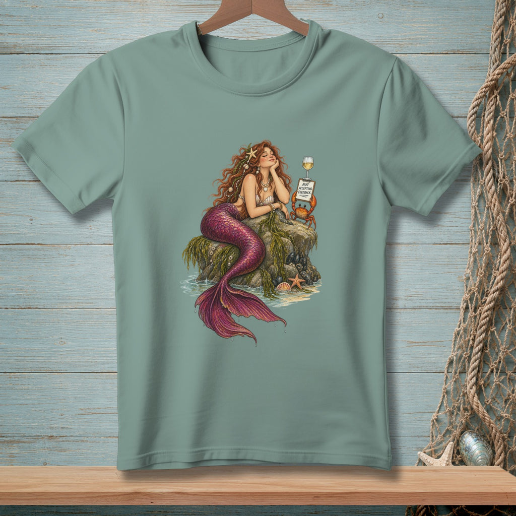 Mermaid on rock with wine glass and crab holding sign: "Not accepting feedback."