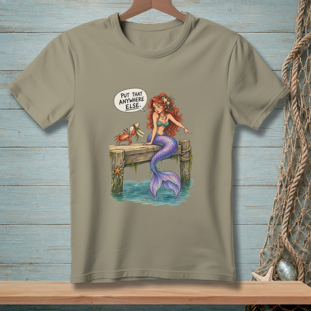 Mermaid on dock with crab, speech bubble says "Put that anywhere else."
