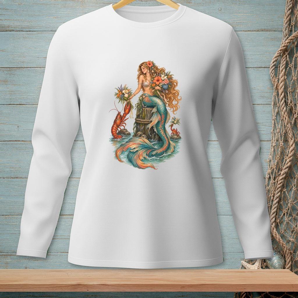 Long sleeve shirt with mermaid, lobster, crab, and flowers on a wooden post.