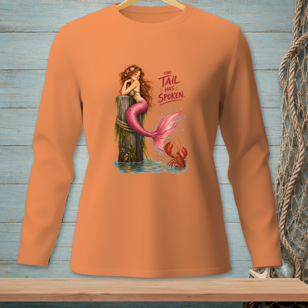 Orange long-sleeve shirt with a mermaid and lobster graphic and "The Tail Has Spoken" text.