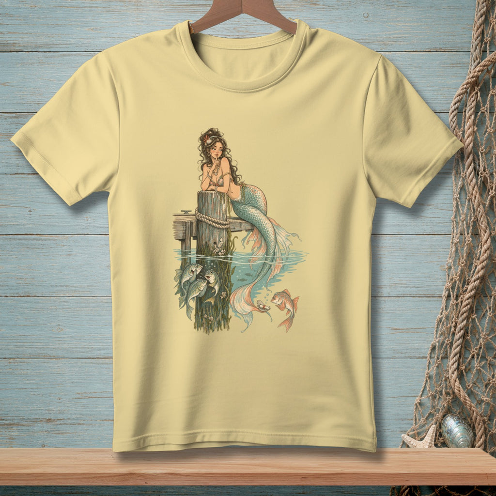 Pale yellow t-shirt with a vintage mermaid and fish illustration.