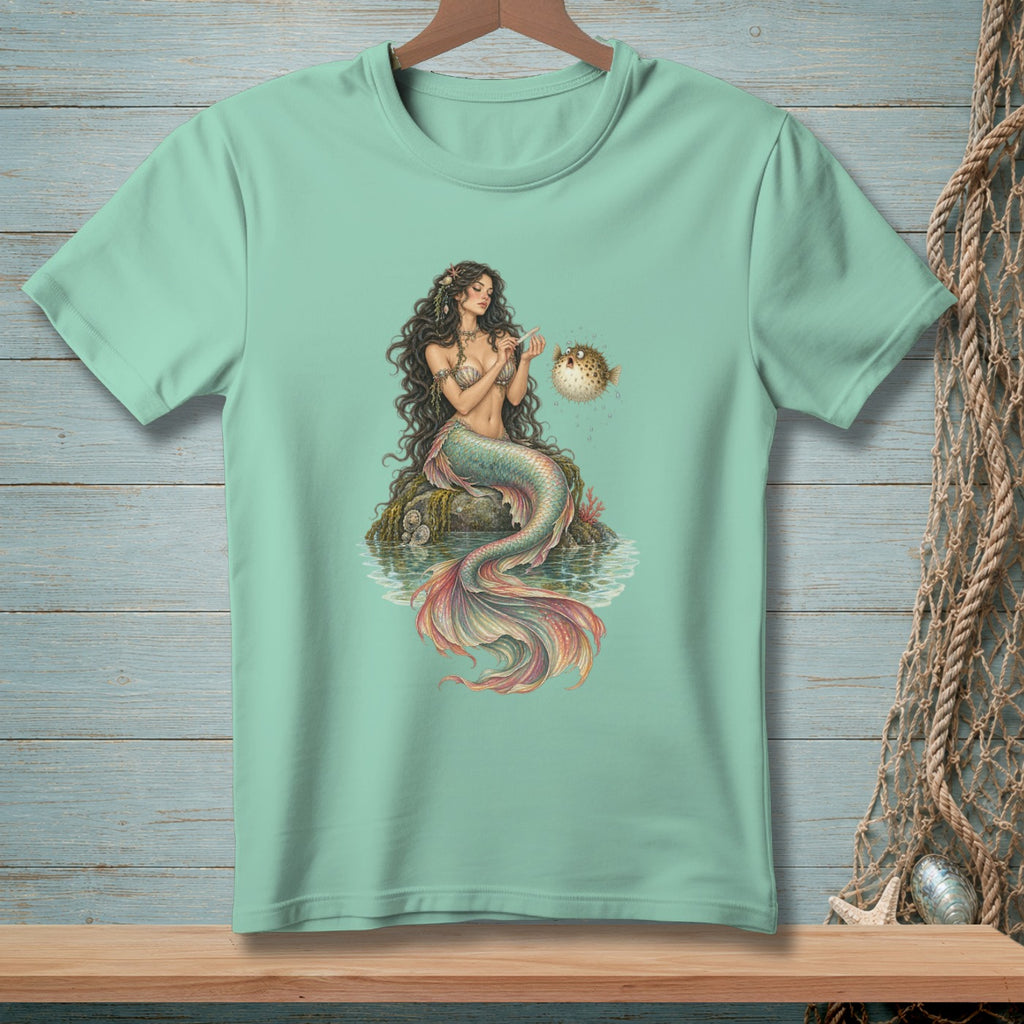 Mint t-shirt with illustration of a mermaid and a pufferfish.