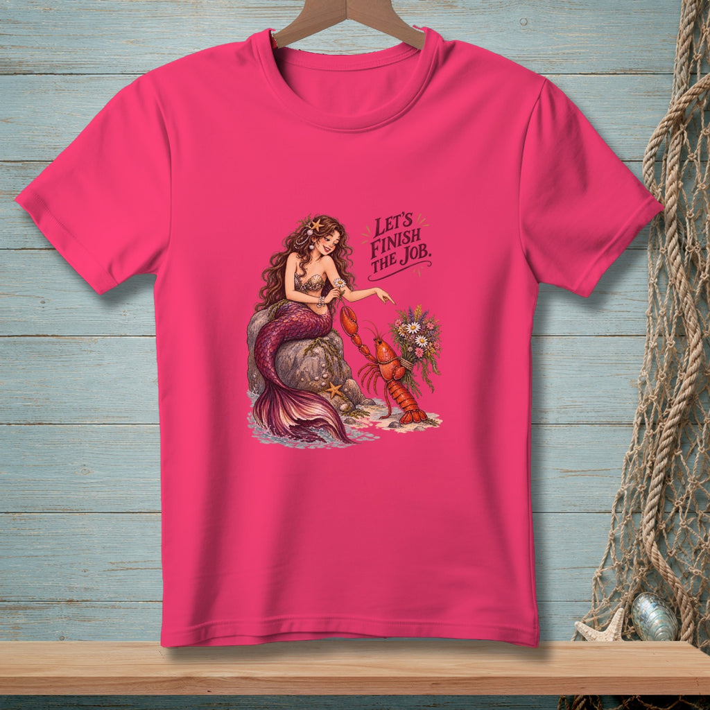 Pink t-shirt with a mermaid and lobster graphic and the text "Let's finish the job."