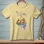 T-shirt graphic of mermaid with champagne and a seagull, with text "This Isn't a Community Resource".