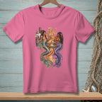 Three mermaids sit together on a dock, enjoying drinks and snacks.