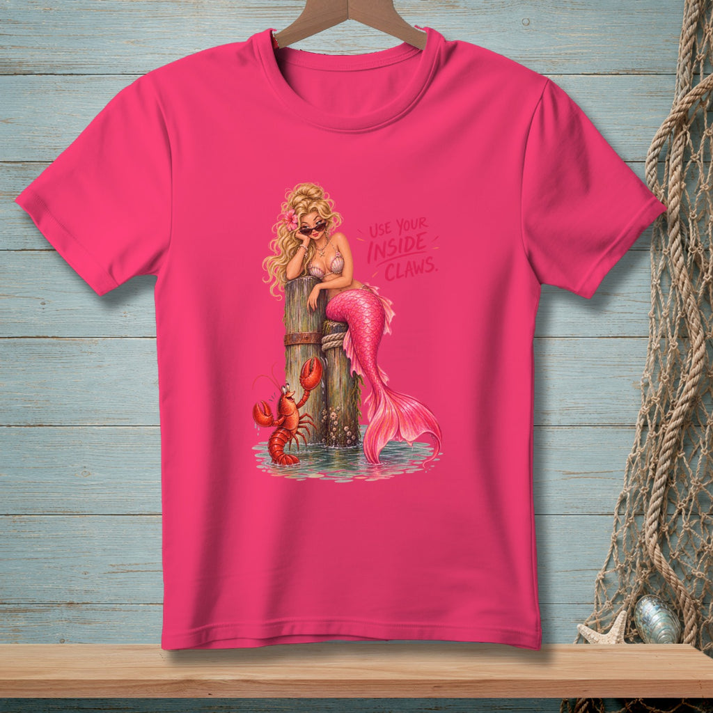 Pink t-shirt with a blonde mermaid and lobster, reading "USE YOUR INSIDE CLAWS."