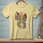 Three mermaids sit at a table on a dock, with a bottle of champagne and drinks.