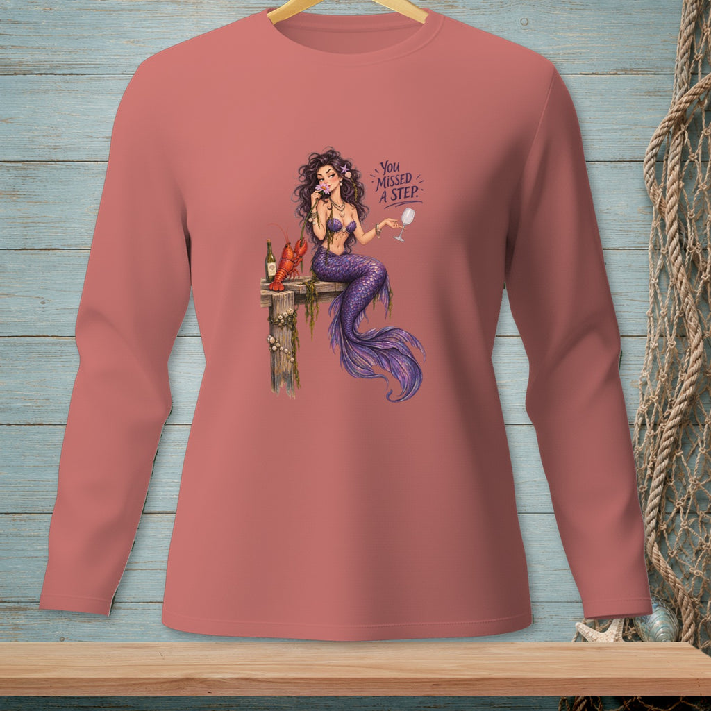 Mermaid with lobster and wine on dock, text "You missed a step."
