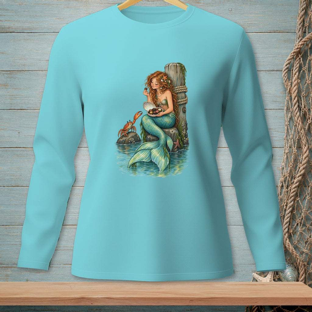 Mermaid sitting on a rock with a crab, holding a shell of pearls.