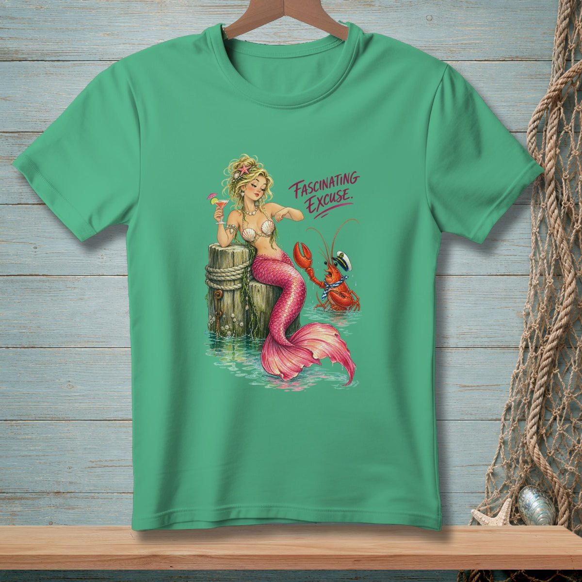 Mermaid with pink tail holding a drink and lobster on a pier, text "FASCINATING EXCUSE."