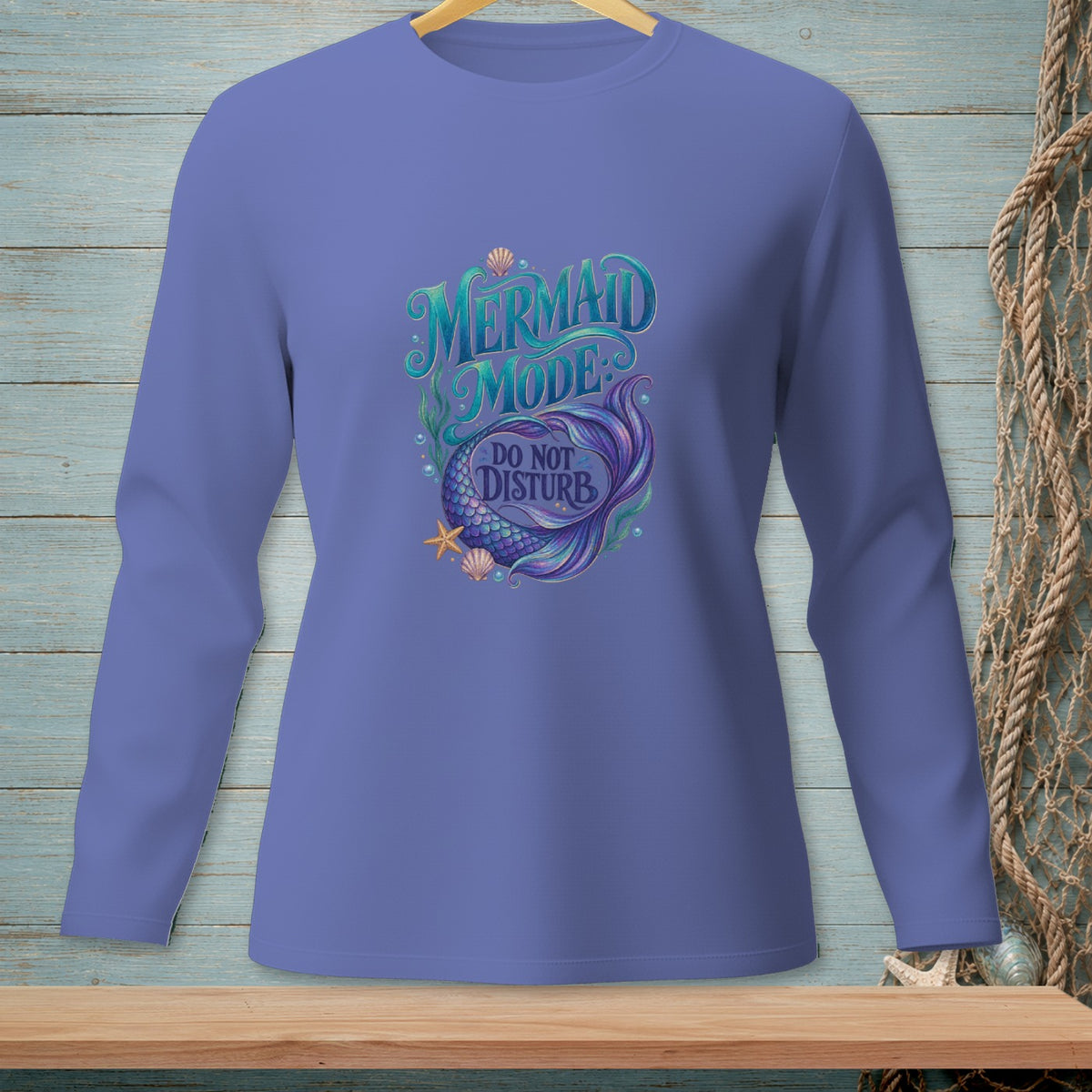 Long sleeve shirt with "Mermaid Mode Do Not Disturb" text and mermaid tail graphic.