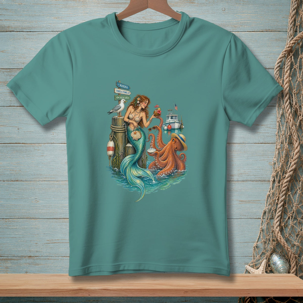 Mermaid with octopus and boat on dock with "Marina" and "Tides & Tunes" signs.