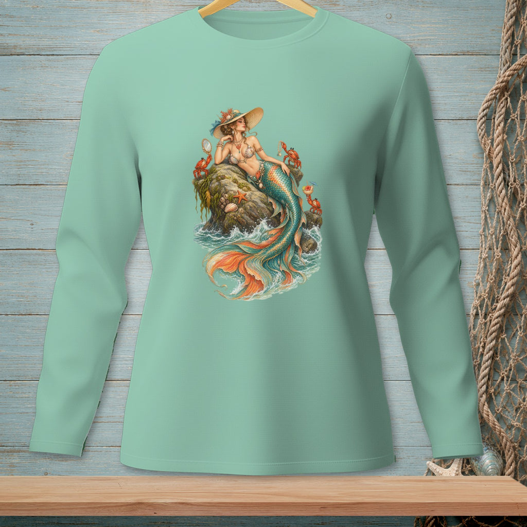 Mint green long-sleeve shirt with a vintage mermaid on a rock illustration.