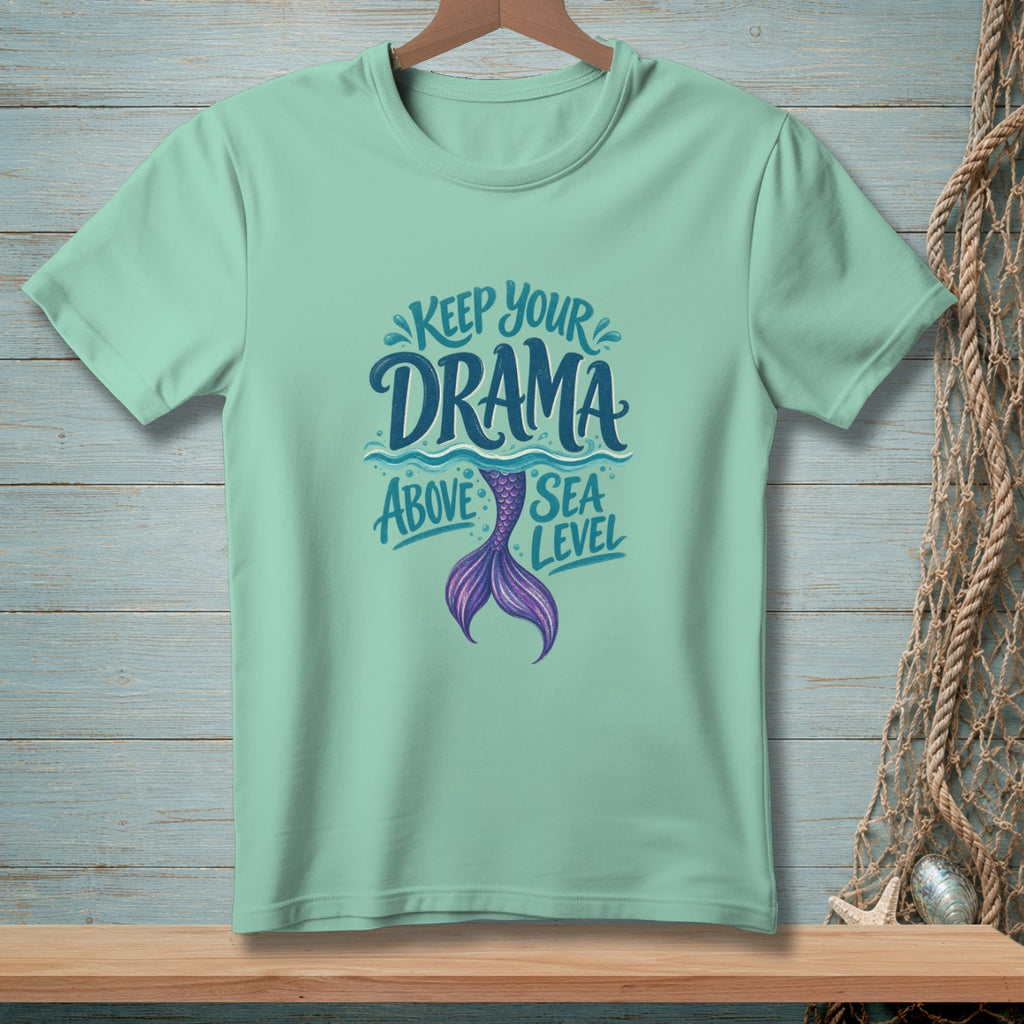 Light mint t-shirt with "Keep Your Drama Above Sea Level" and mermaid tail graphic.