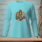 Three mermaids with colorful tails sit on rocks sharing a cake.