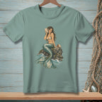 Mermaid holding seashell, sitting on a rock with waves and shells.